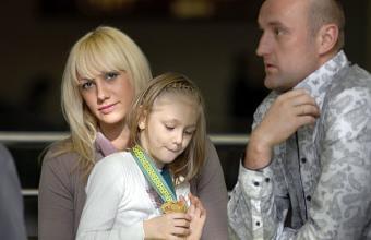 Павел Беганский с женой Екатериной и дочерью Настей. Фото с сайта www.goals.by